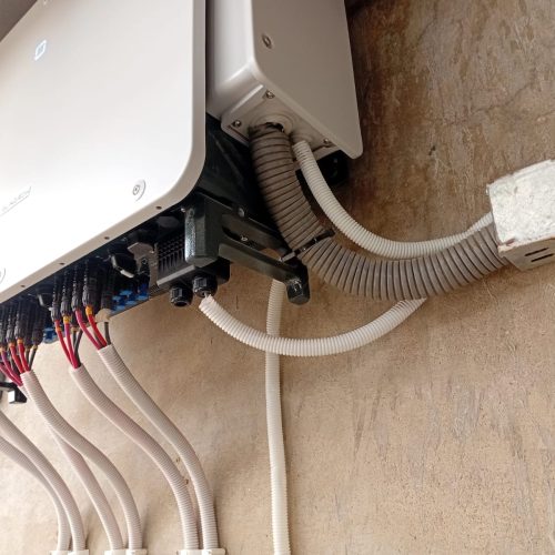 A white box with multiple wires connected to it